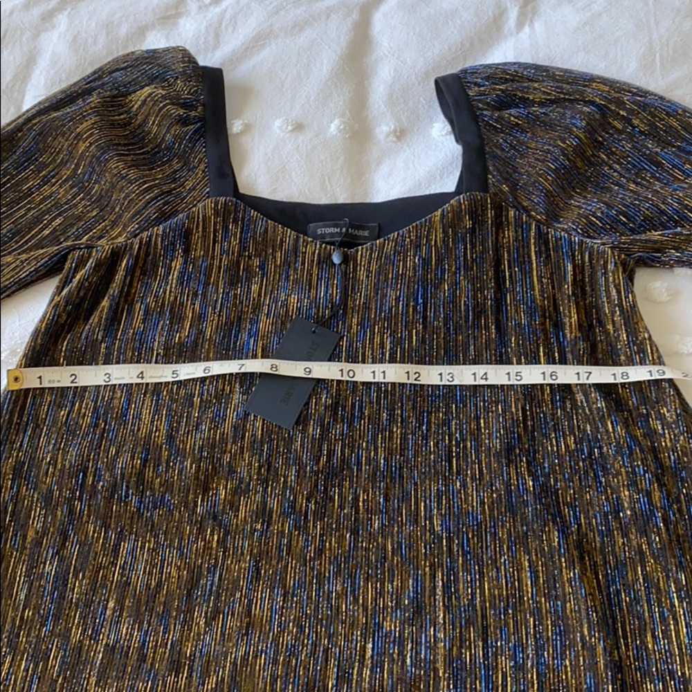 Metallic dress by storm and Marie